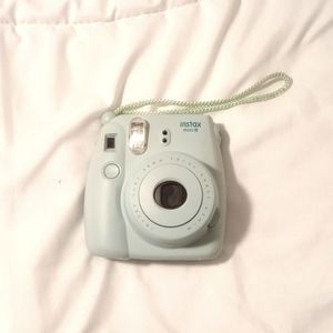 Instax mini 8 camera w/ case + two packets of film (opened but never used).